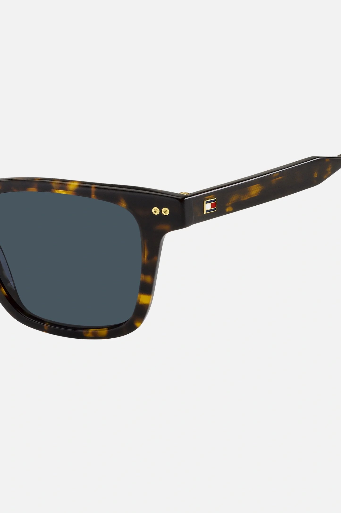 Occhiali da sole Tommy Hilfiger TH 2127/S 086KU, montatura tartarugato con lenti blu.