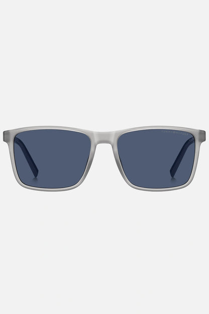 Occhiali da sole Tommy Hilfiger TH 2201/S 09VKU, montatura trasparente opaco con aste blu e lenti blu.