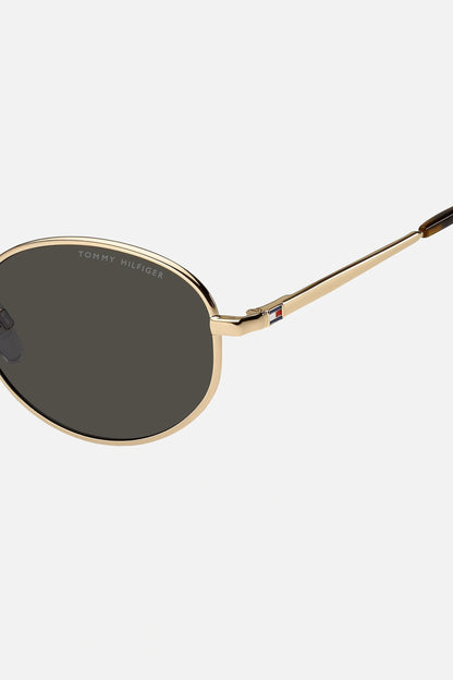 Occhiali da sole Tommy Hilfiger TH 2219/S 000IR, montatura oro lucido con lenti grigio scuro.